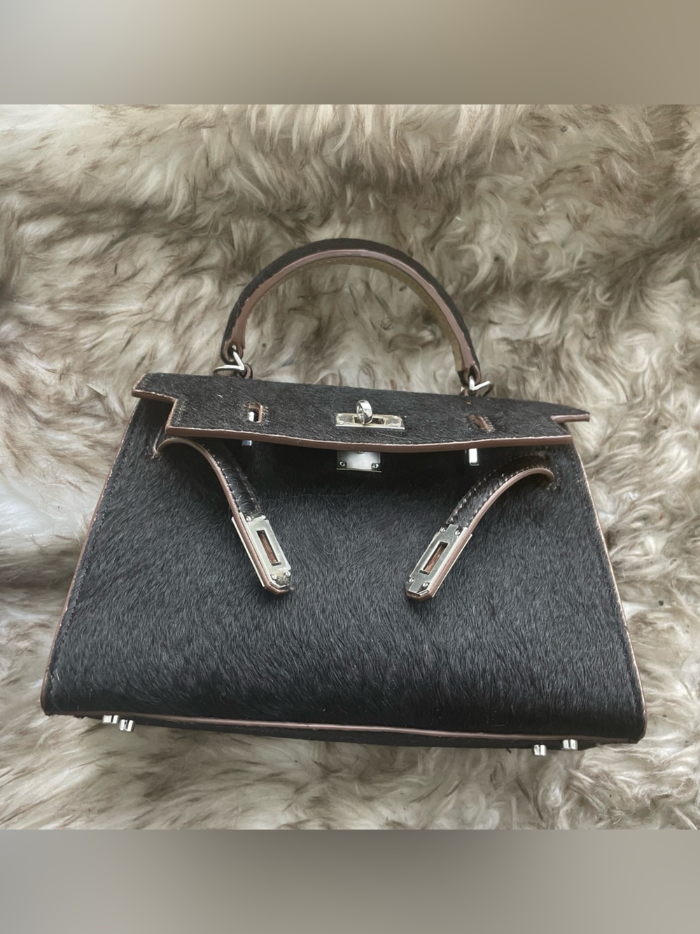 Calechie Black Genuine Hide Mini